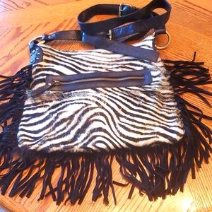 Innue leather,zebra print, cross body purse.